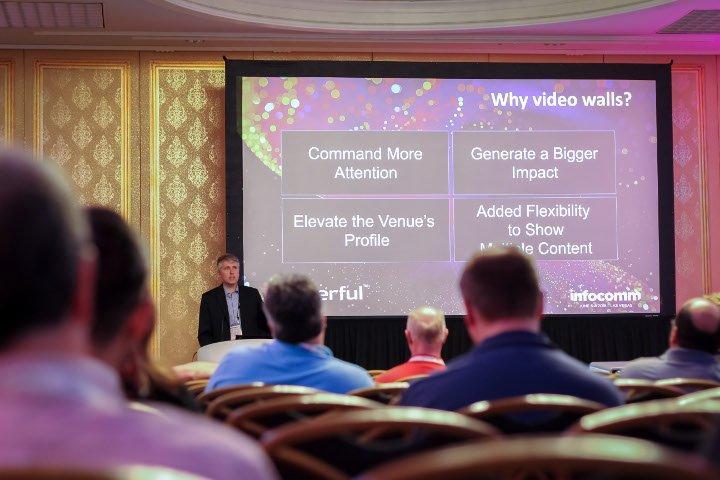 Tim Griffin, CTO of Userful, giving a presentation about AV-over-IP, and why video walls are important at Infocomm 2018