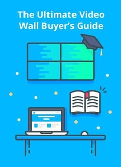 The Ultimate Video Wall Buyer's Guide, video wall graphic with graduation cap on it, and a desk with a laptop and mouse, and book