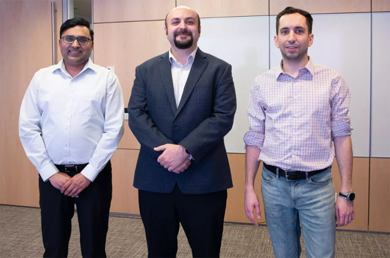 Userful employees standing in boardroom. 